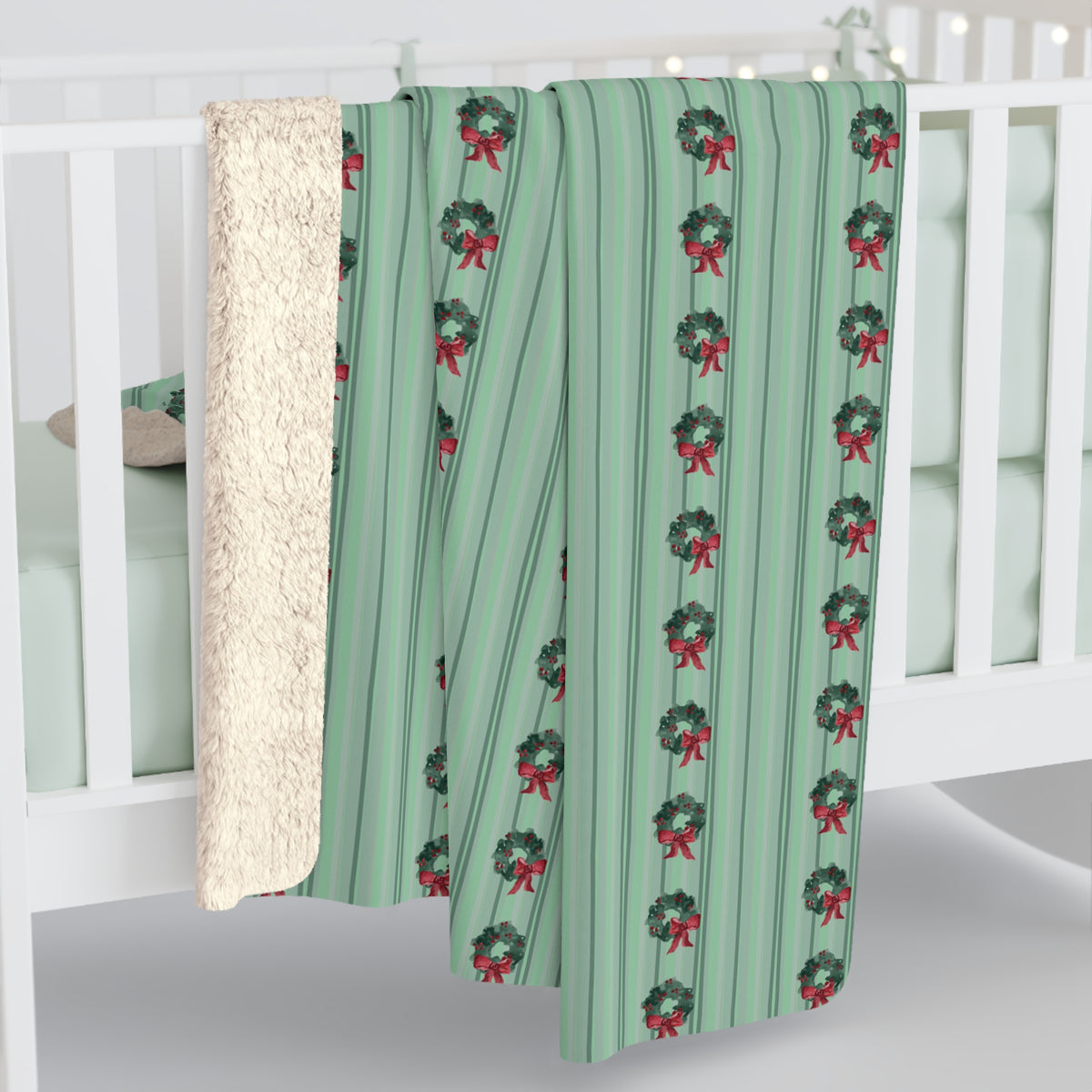 Floral Watercolor Sherpa Fleece Blanket — hanging over a crib rail (view 2)