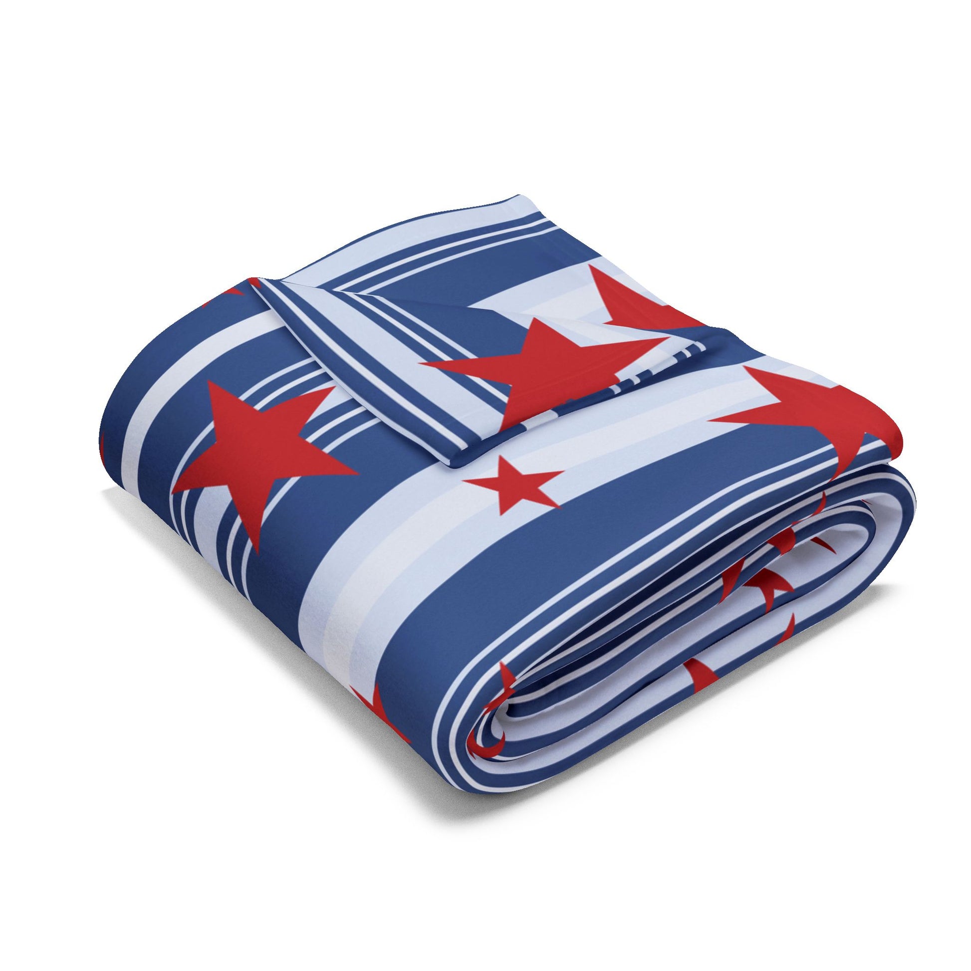 Folded blanket with red star pattern on a white background