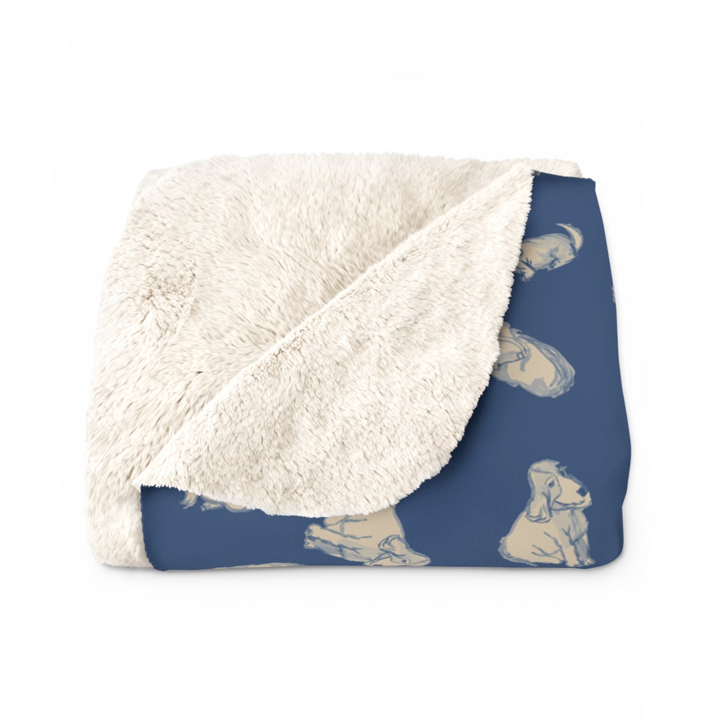 Blanket with white sherpa interior and blue pattern on a white background