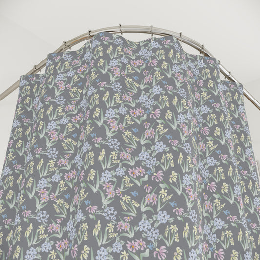 Floral patterned shirt on a hanger against a white background