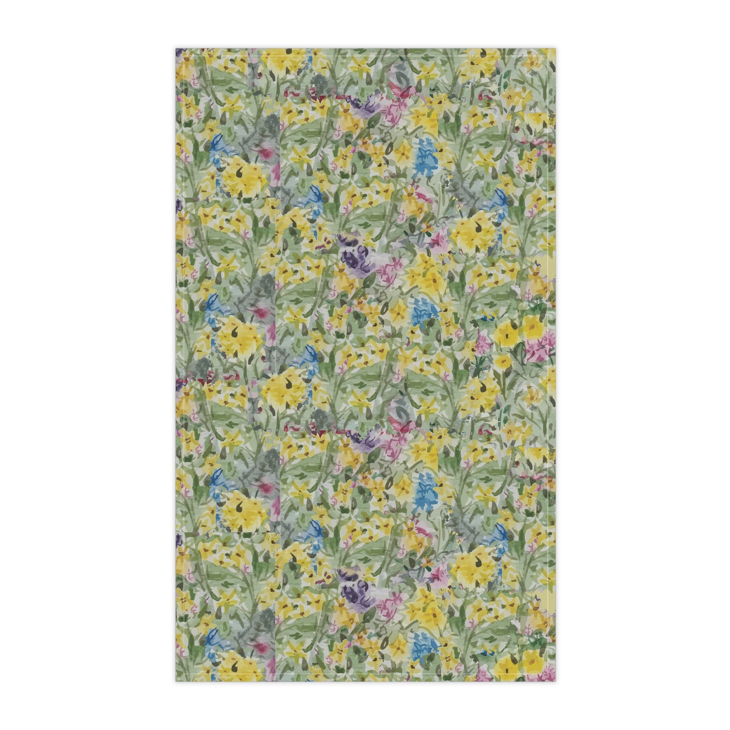 Watercolor wildflower tea towel featuring yellow, blue, and pink floral meadow pattern.