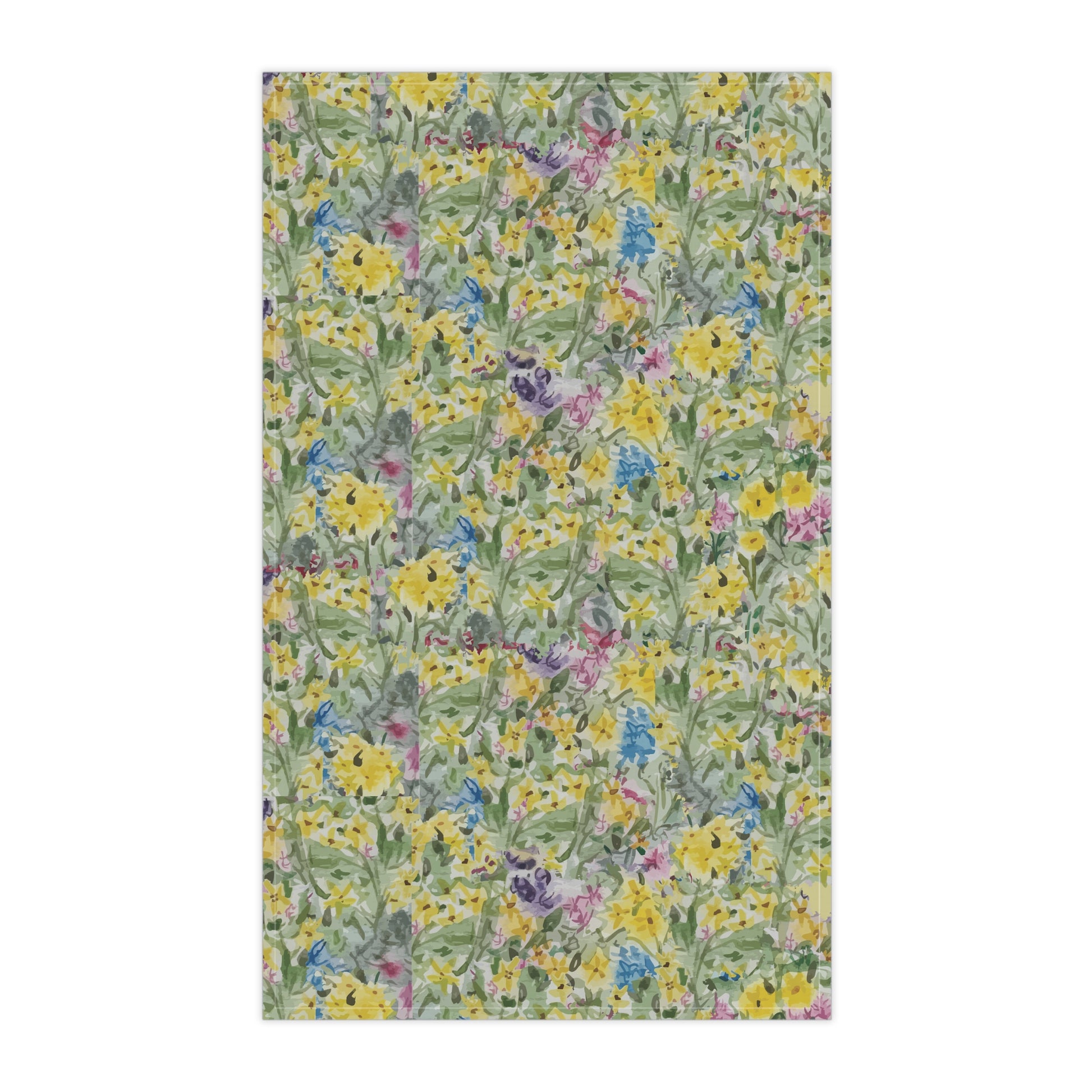Watercolor wildflower tea towel featuring yellow, blue, and pink floral meadow pattern.