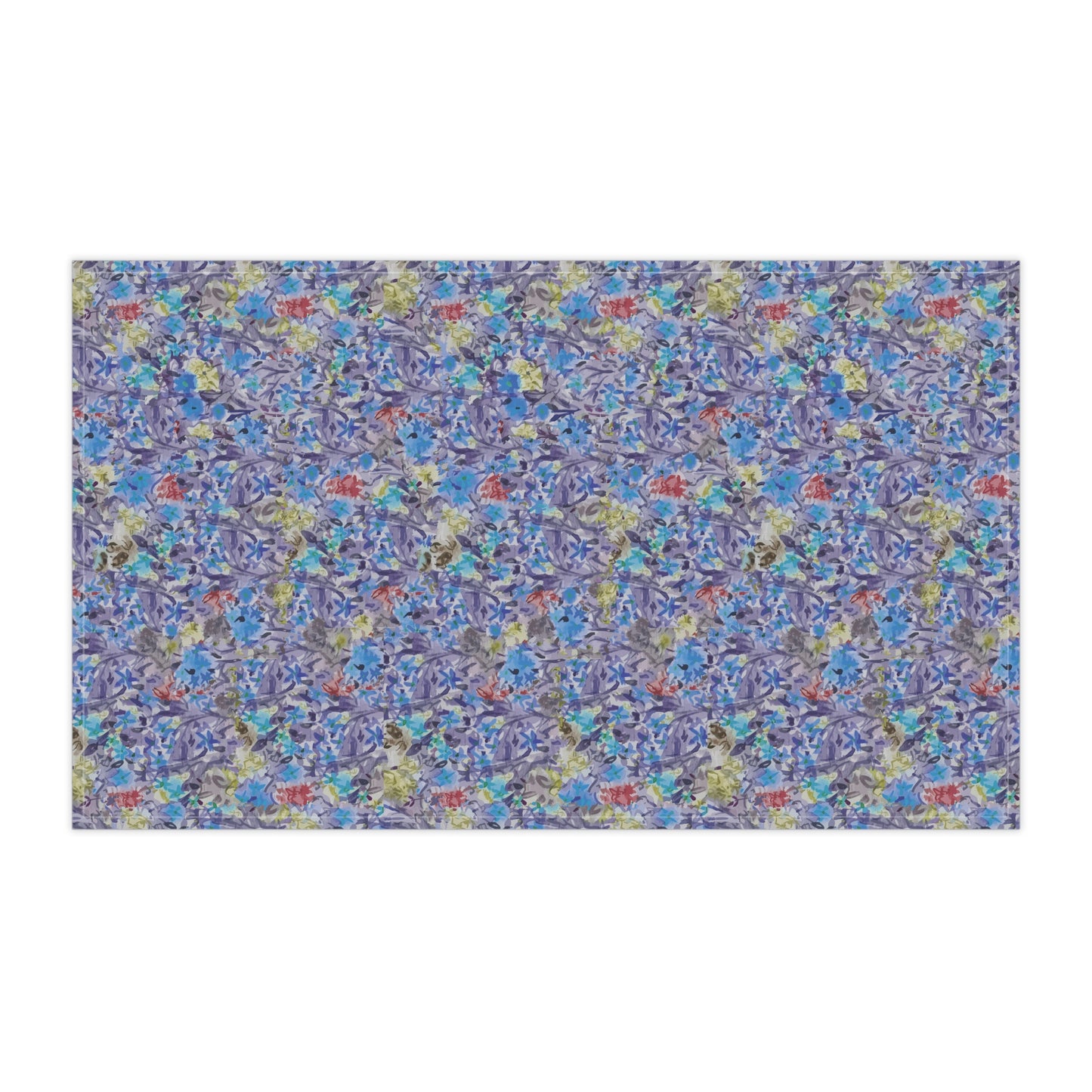 Watercolor floral tea towel with pink blossoms, earthy brown tones, and soft blue accents in a meadow-style pattern.