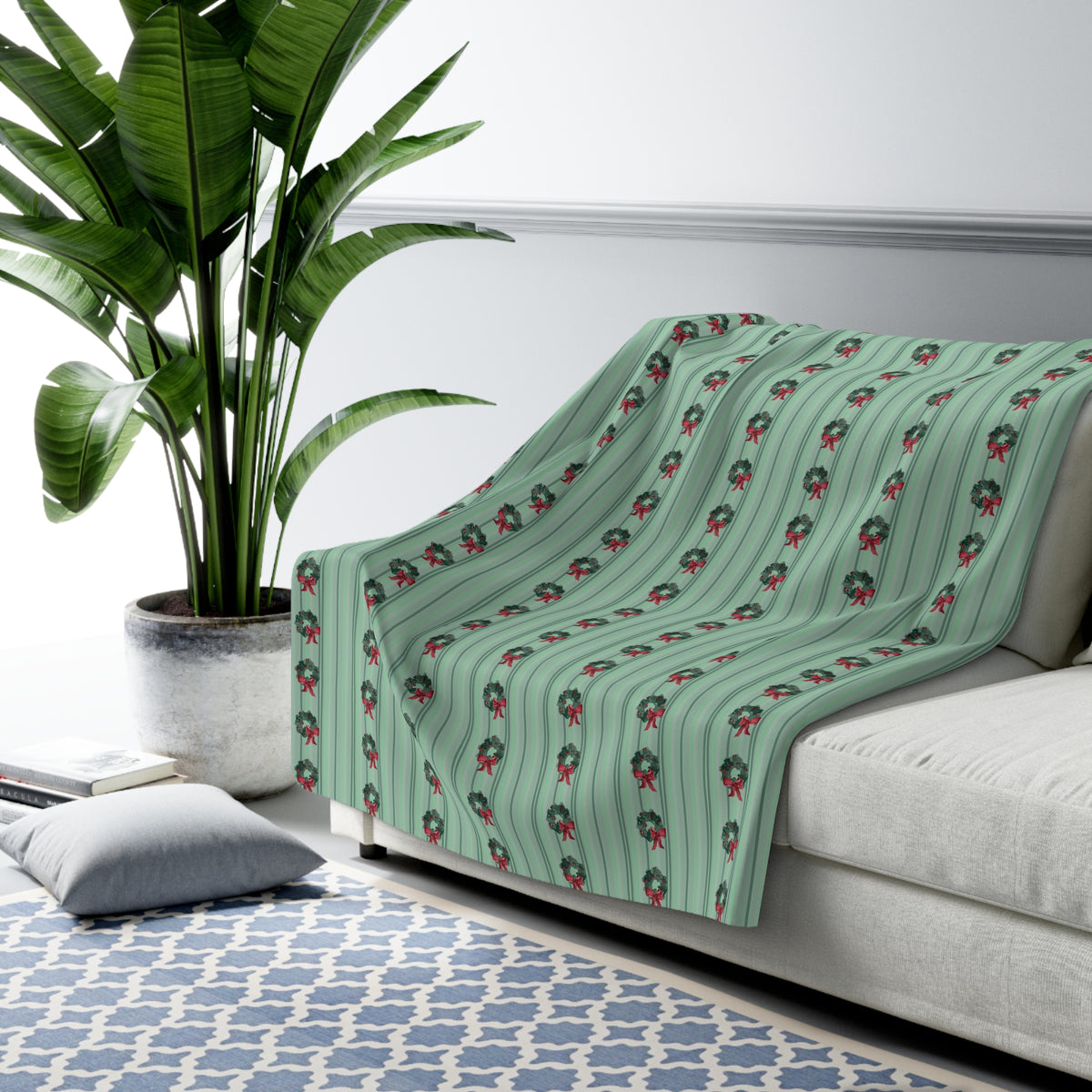 Floral Watercolor Sherpa Fleece Blanket — draped over a sofa (view 2)