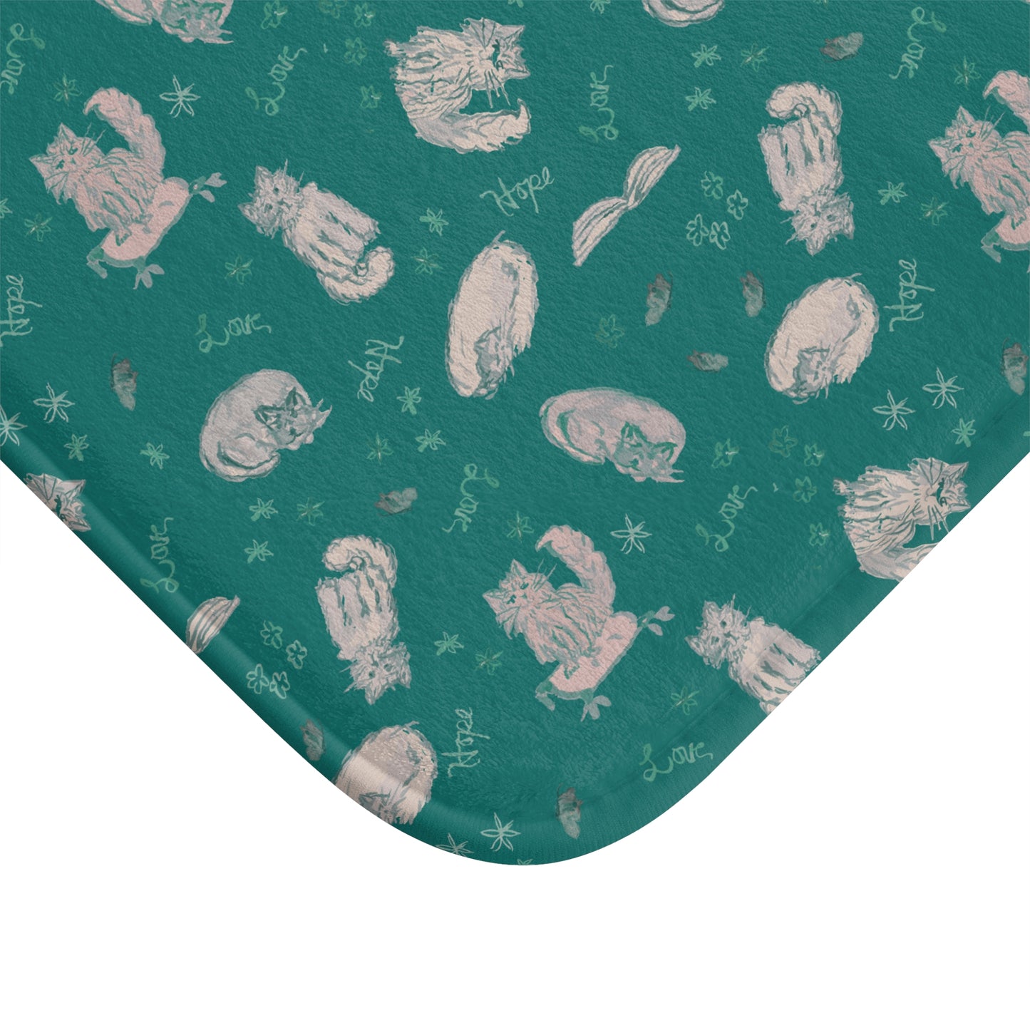 Teal cat-themed bath mat featuring a cozy repeating pattern of sleeping and fluffy cats, books, stars, leaves, and handwritten details in soft cream on a rich jewel-toned background, perfect for cozy cat lover bathroom décor.