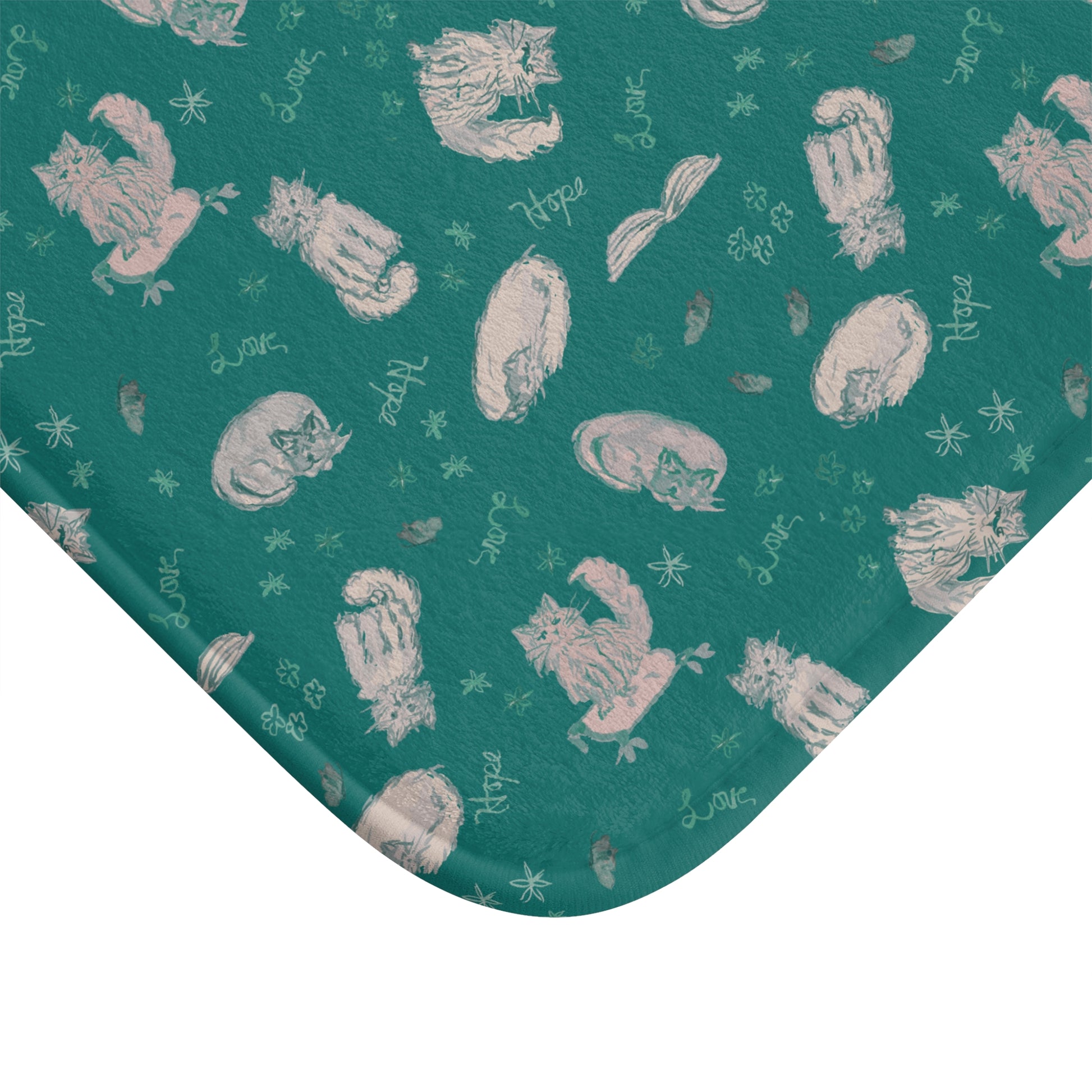 Teal cat-themed bath mat featuring a cozy repeating pattern of sleeping and fluffy cats, books, stars, leaves, and handwritten details in soft cream on a rich jewel-toned background, perfect for cozy cat lover bathroom décor.