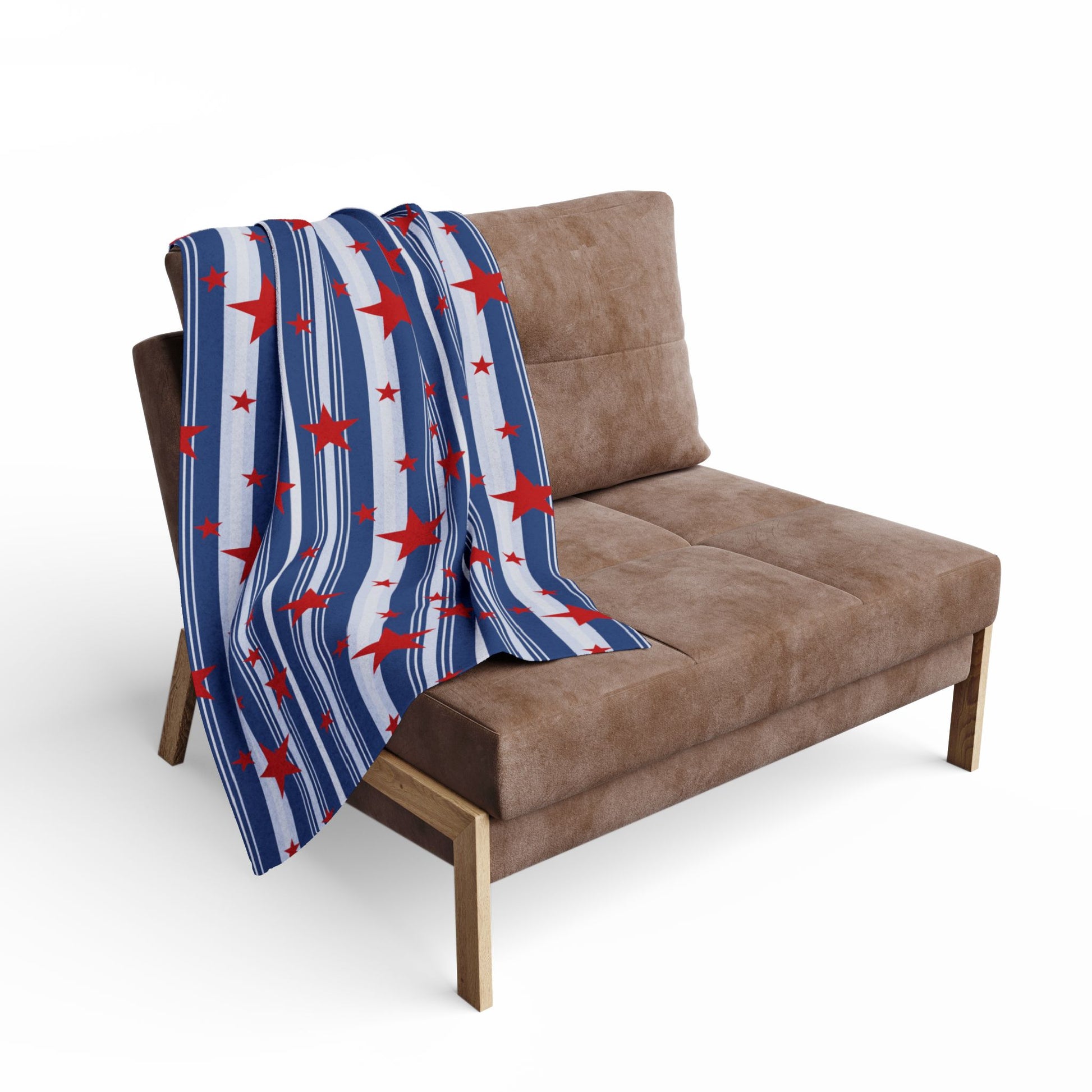 Brown sofa with a blue blanket featuring red stars on a white background