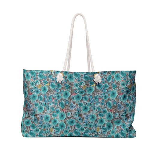 Weekender tote with turquoise watercolor florals, cream rope handles and gold grommets