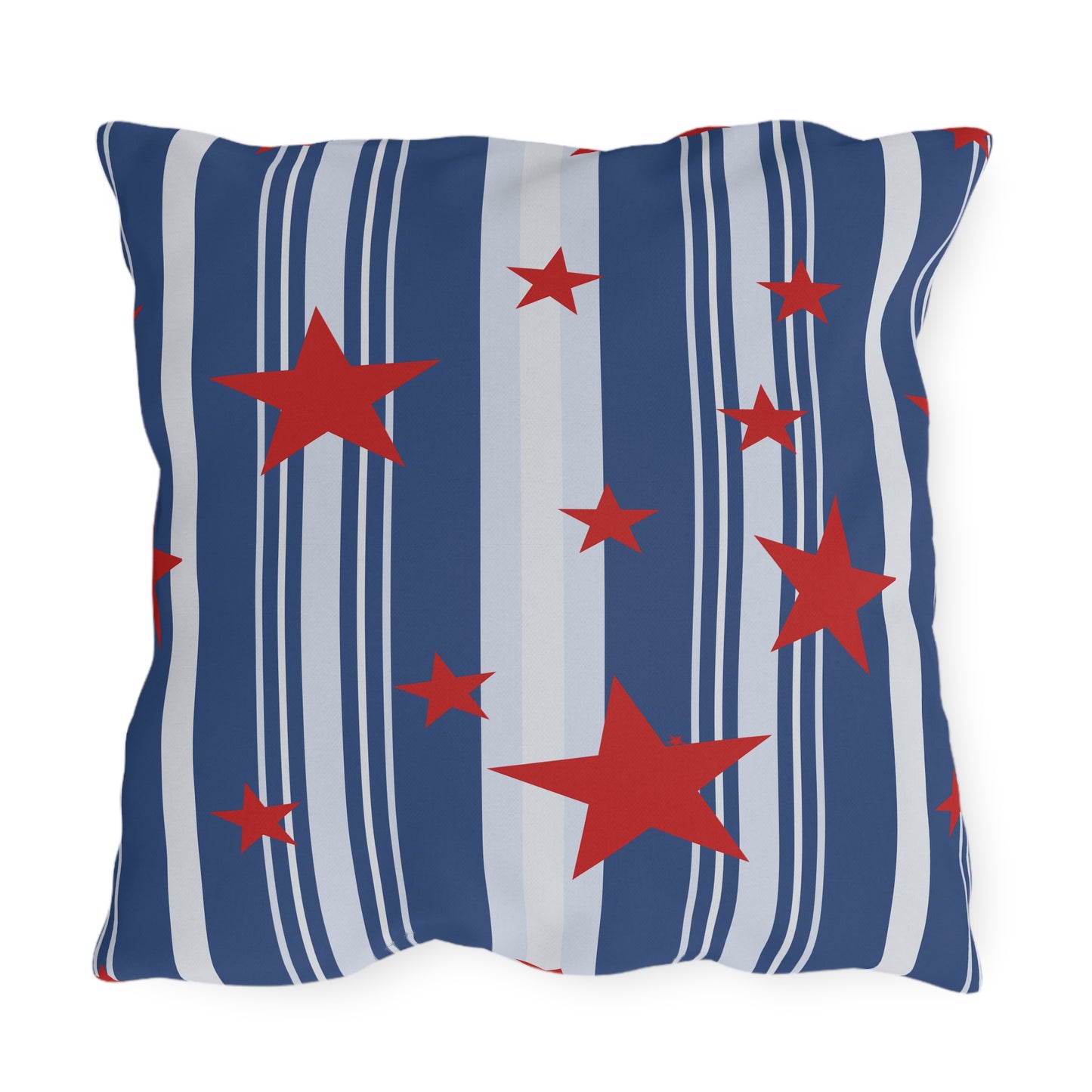 Pillow with red star pattern on a blue and gray striped background