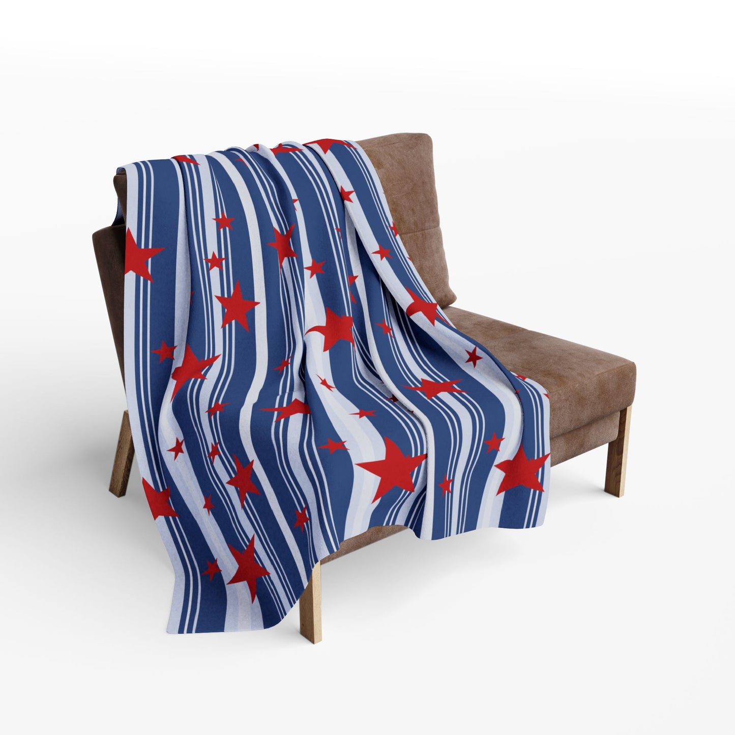 Blue and white striped blanket with red stars draped over a brown chair.
