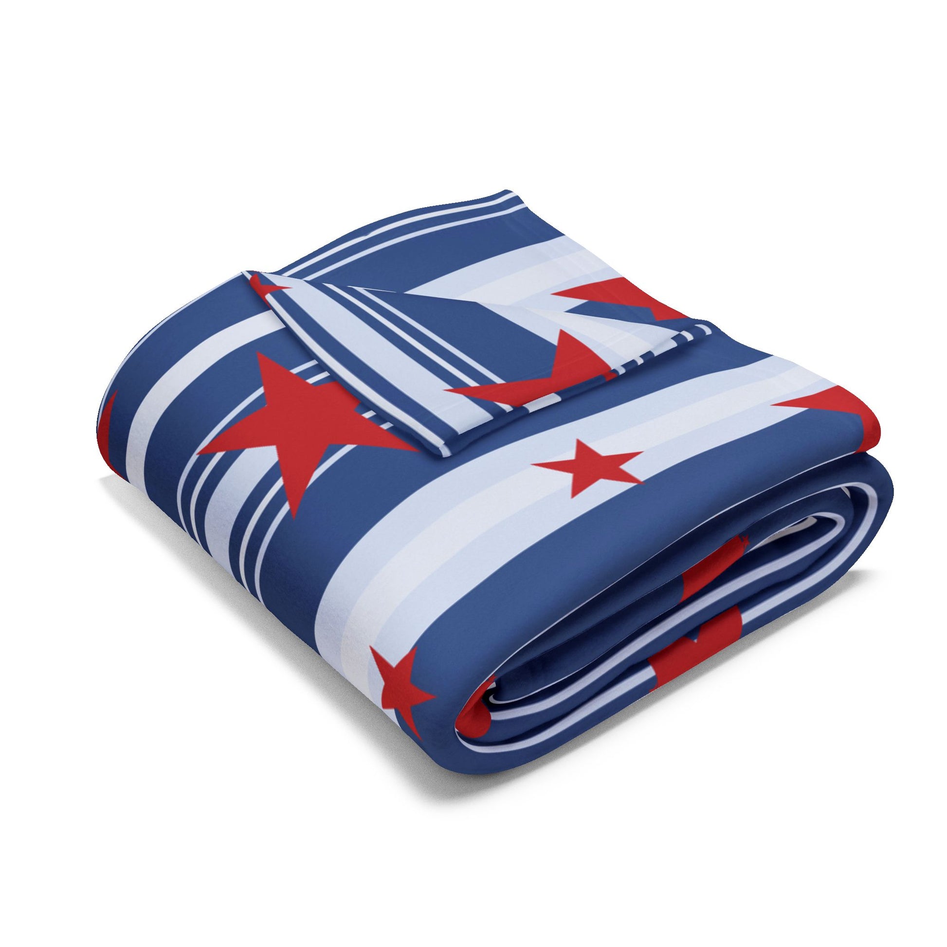 Folded blanket with red star pattern on a white background