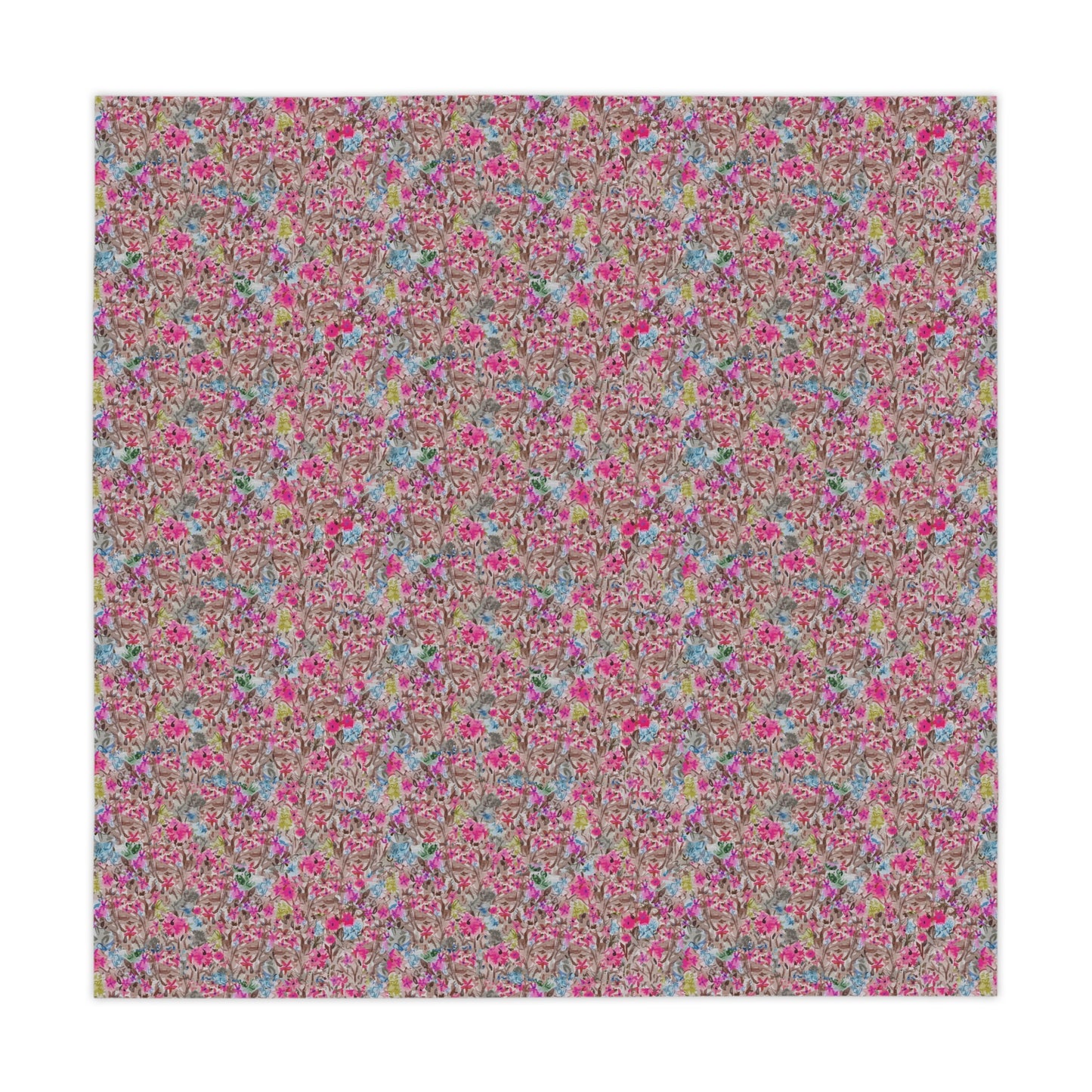 Floral patterned fabric swatch with pink and multicolor flowers on a white background. Modern floral table cover with bold pink blossoms and soft blue highlights