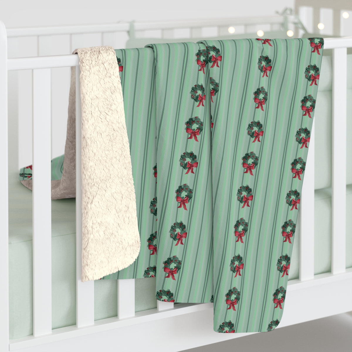 Floral Watercolor Sherpa Fleece Blanket — hanging over a crib rail