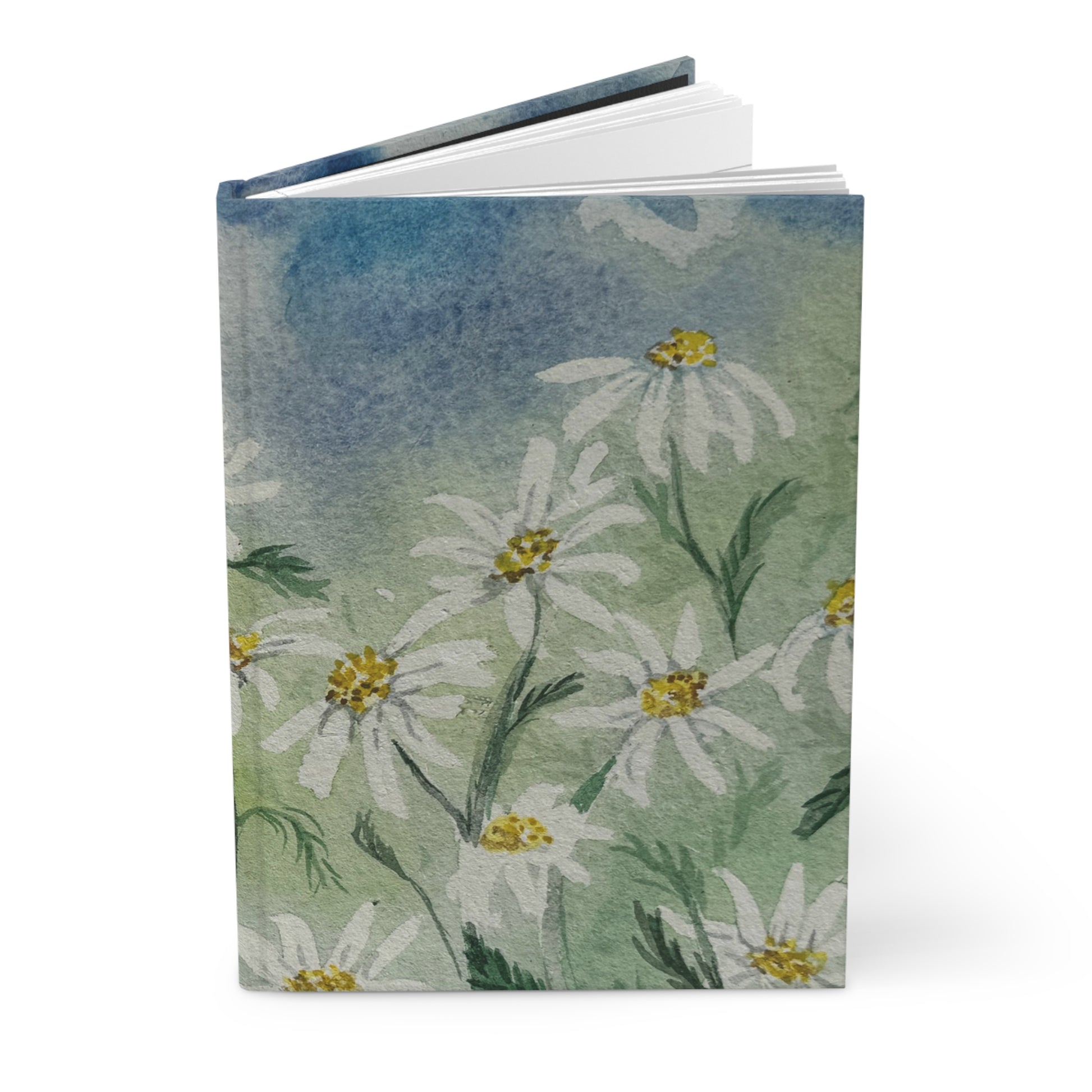 Notebook with floral design on a white background cottage style floral journal with daisy field artwork