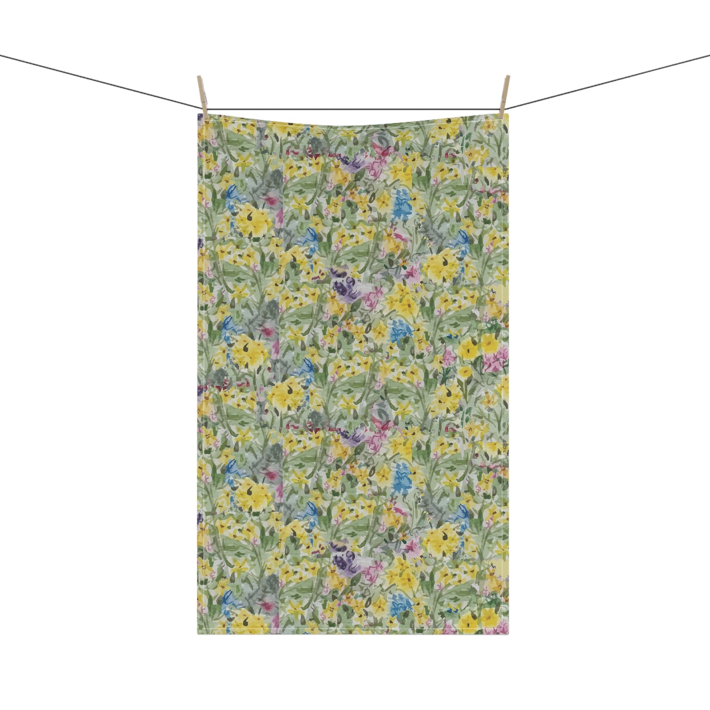 Watercolor wildflower tea towel featuring yellow, blue, and pink floral meadow pattern 