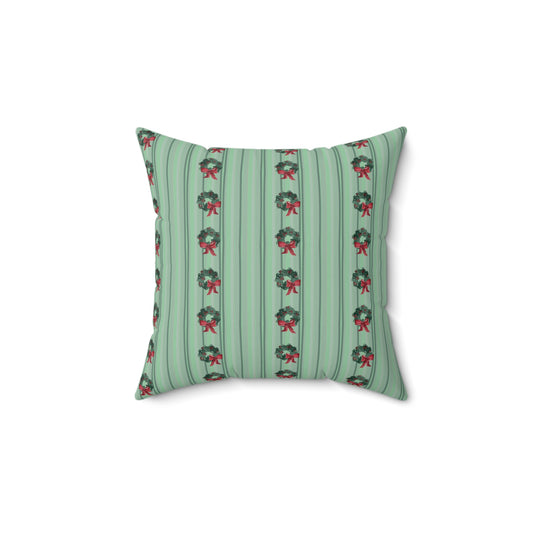 Faux suede throw pillow with a festive holiday design by Kathryn Young