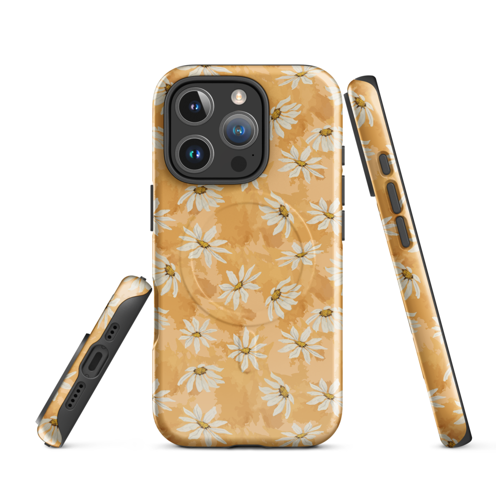 Phone case with white daisy pattern on a warm multi tone peach background