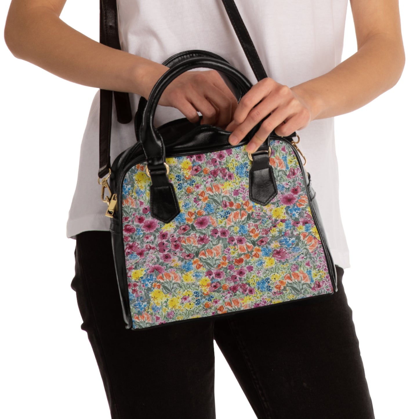 Botanical floral purse featuring meadow flower pattern and classic top handle design