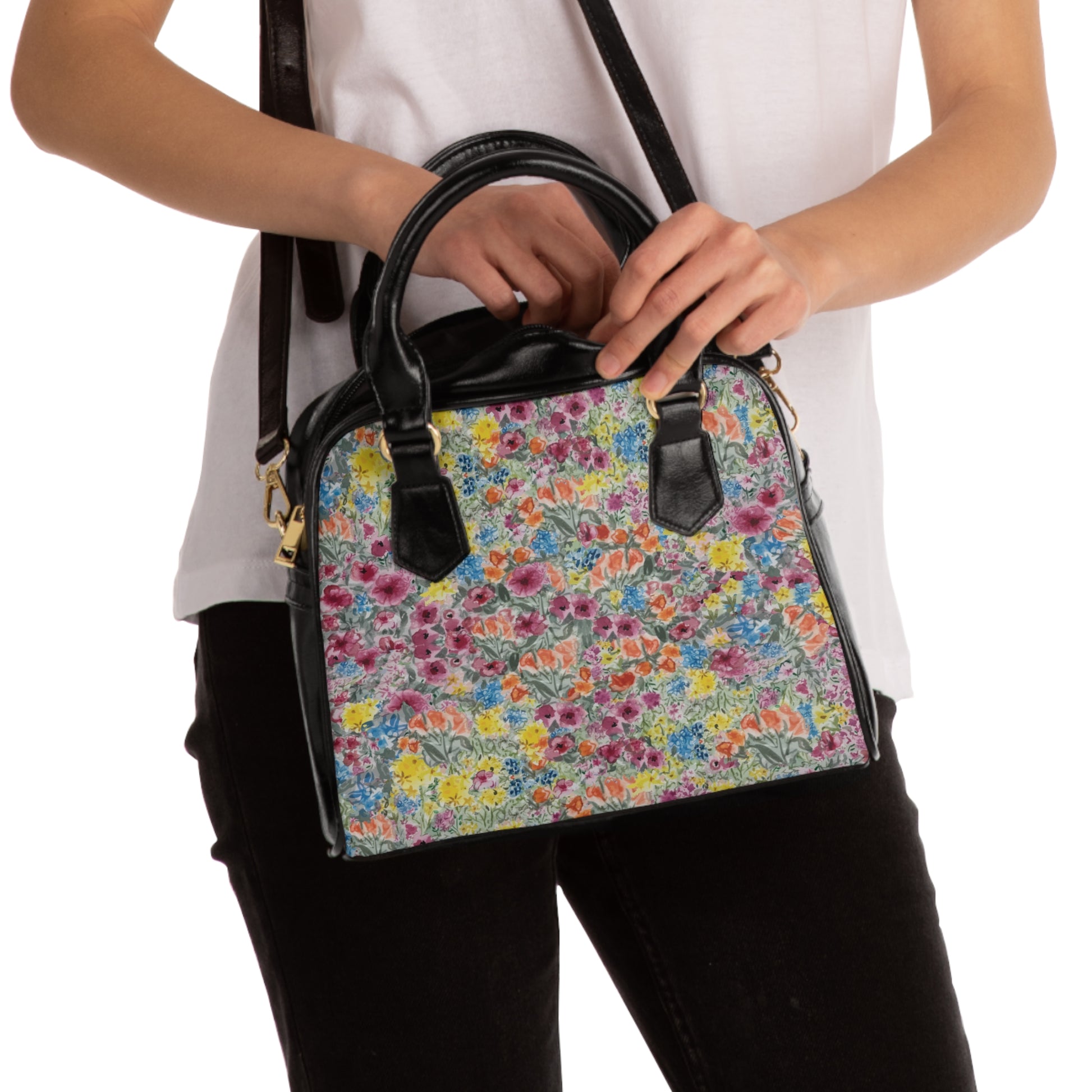 Botanical floral purse featuring meadow flower pattern and classic top handle design