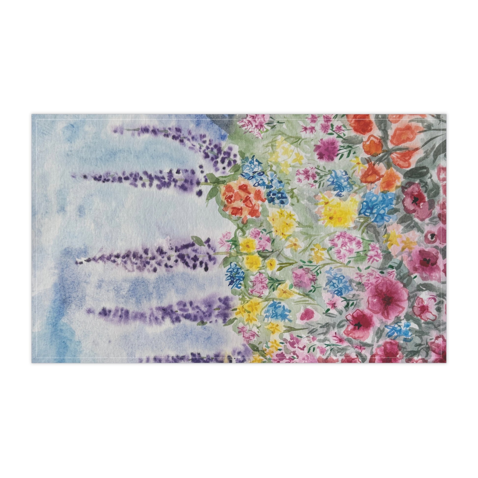 Watercolor floral tea towel featuring lavender stems and colorful wildflowers in soft blue, purple, pink, and yellow tones on a light background.