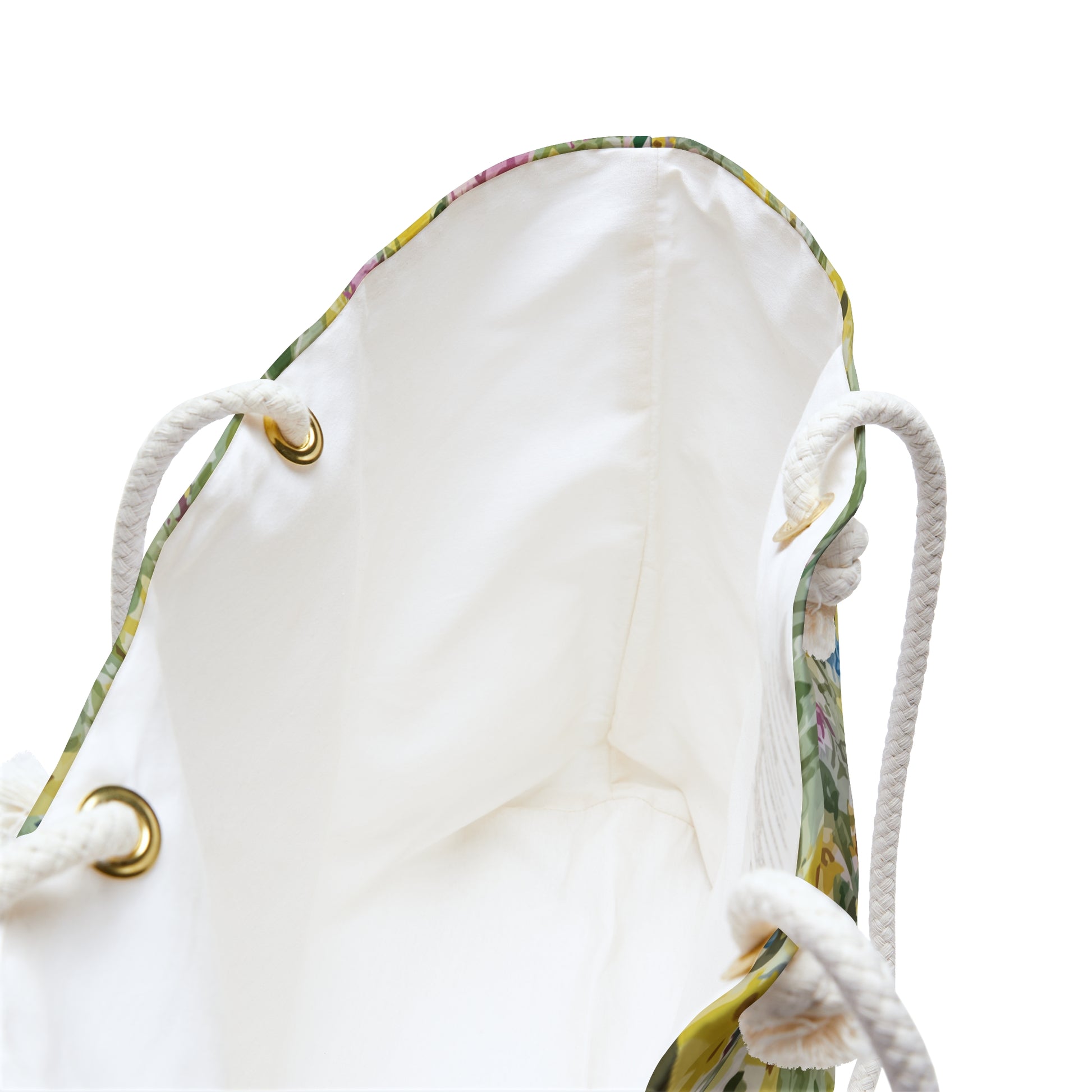 Watercolor wildflower floral weekender tote bag with yellow meadow flowers and green botanical pattern. Top open view of whit interior.