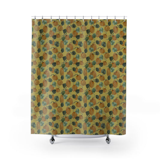 Shower curtain with hand-painted pumpkins and curling vines in muted orange and sage on warm ocher