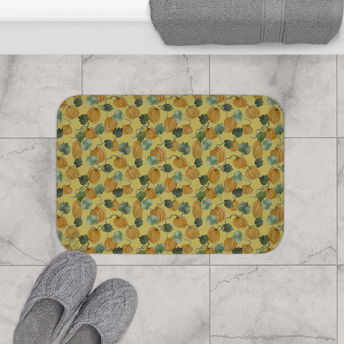 Autumn Pumpkin Vine Watercolor Memory Foam Bath Mat – Golden — on a bathroom floor