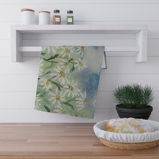 watercolor tea towel with loose daisy field pattern and soft green blue background