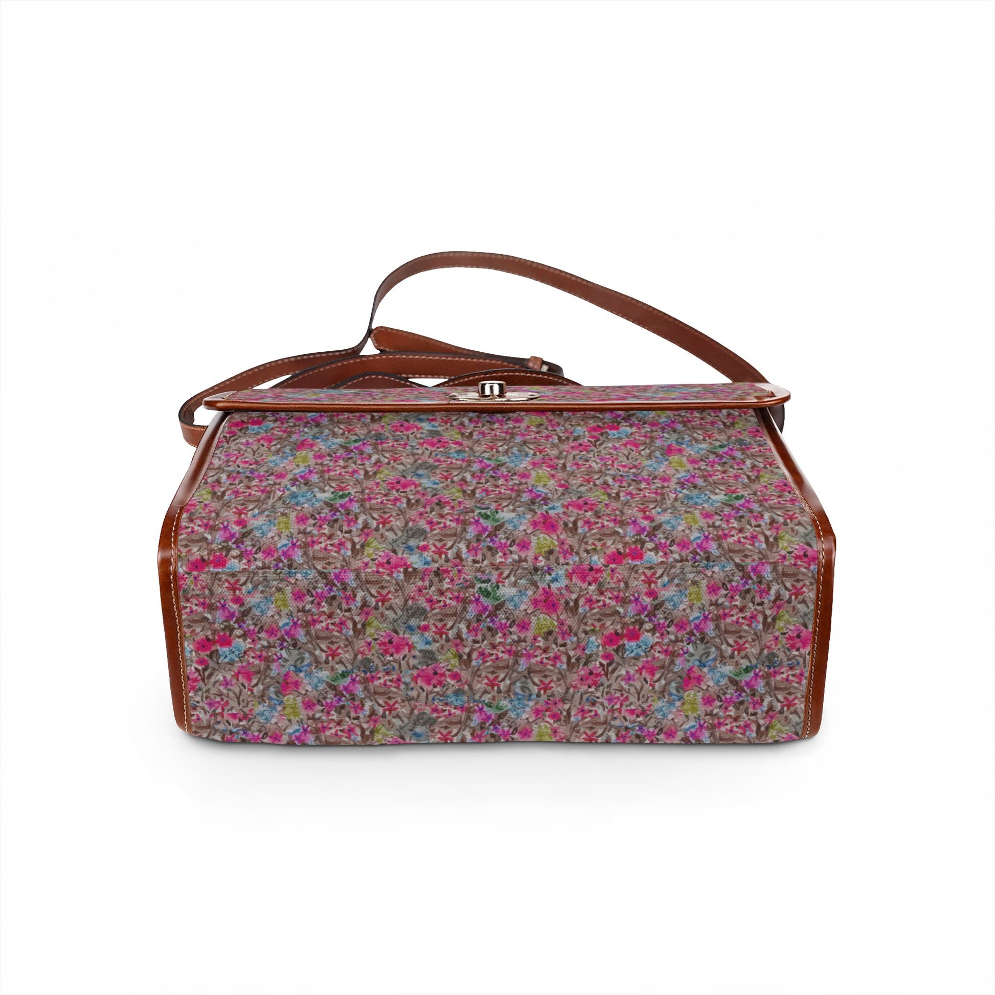 Botanical floral handbag with painterly wildflower pattern and structured vintage style closure