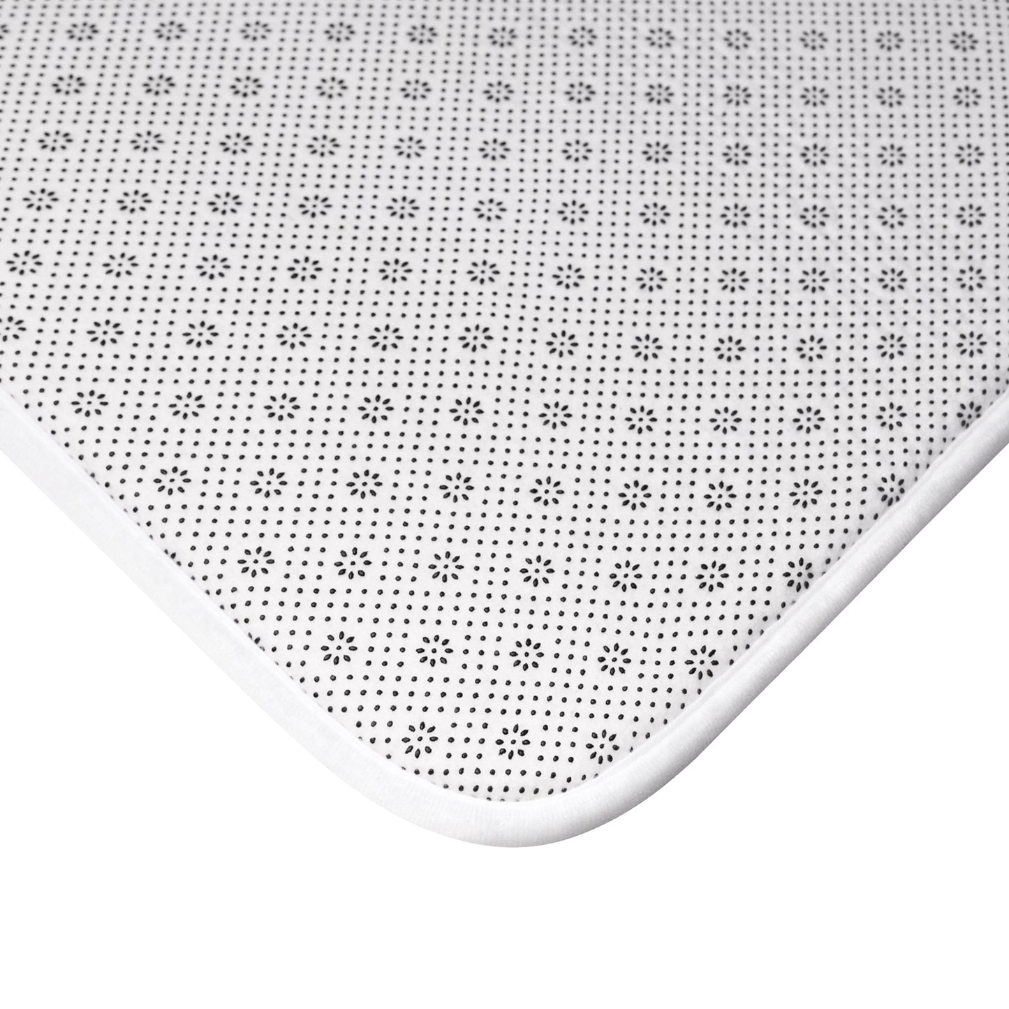 Grippy back of Teal cat-themed bath mat featuring a cozy repeating pattern of sleeping and fluffy cats, books, stars, leaves, and handwritten details in soft cream on a rich jewel-toned background, perfect for cozy cat lover bathroom décor.