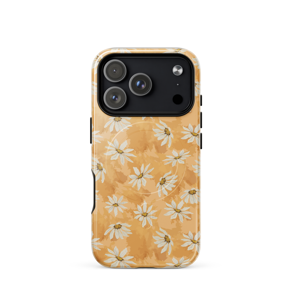 Phone case with white daisy pattern on a warm multi tone peach background