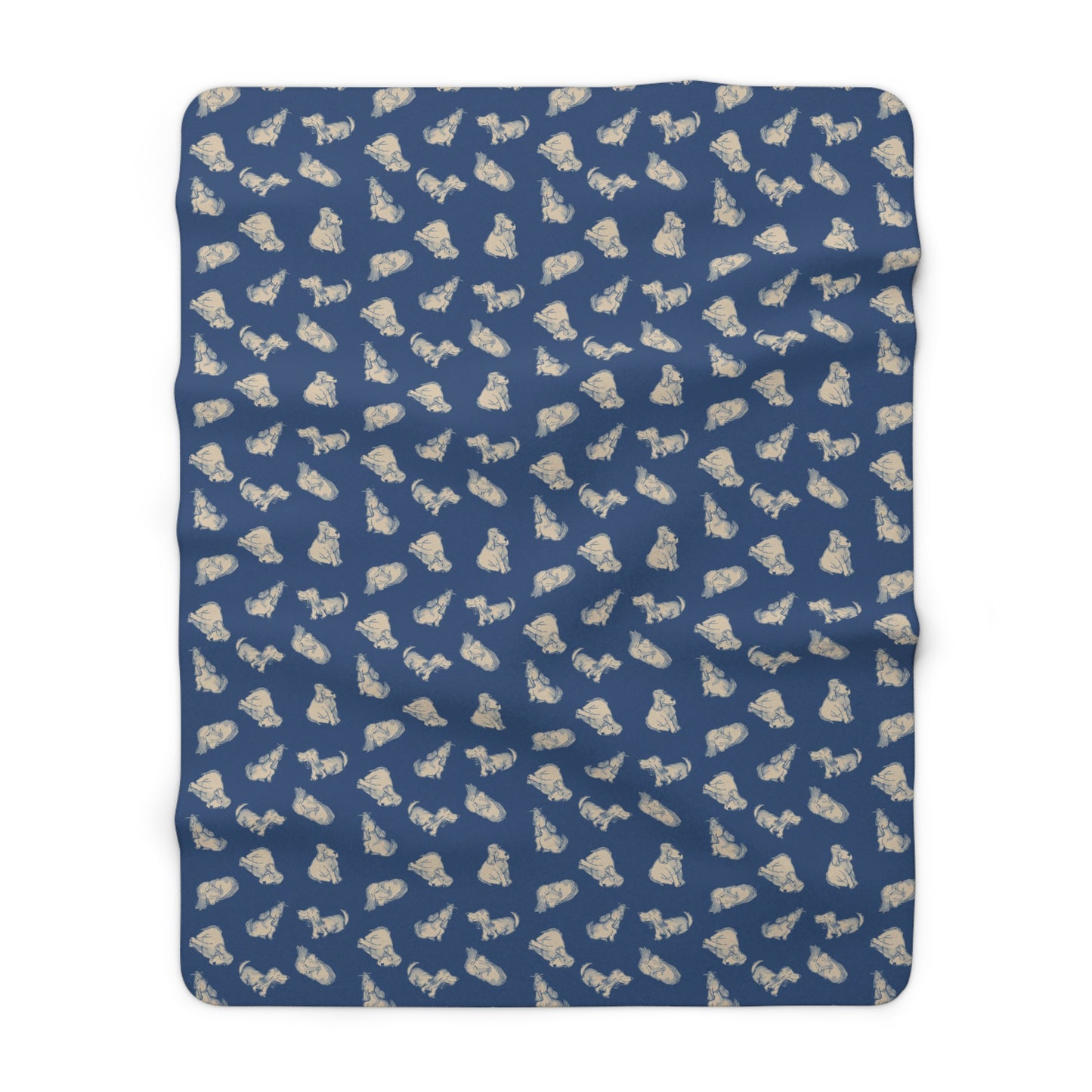Folded blue blanket with beige dog pattern on a white background