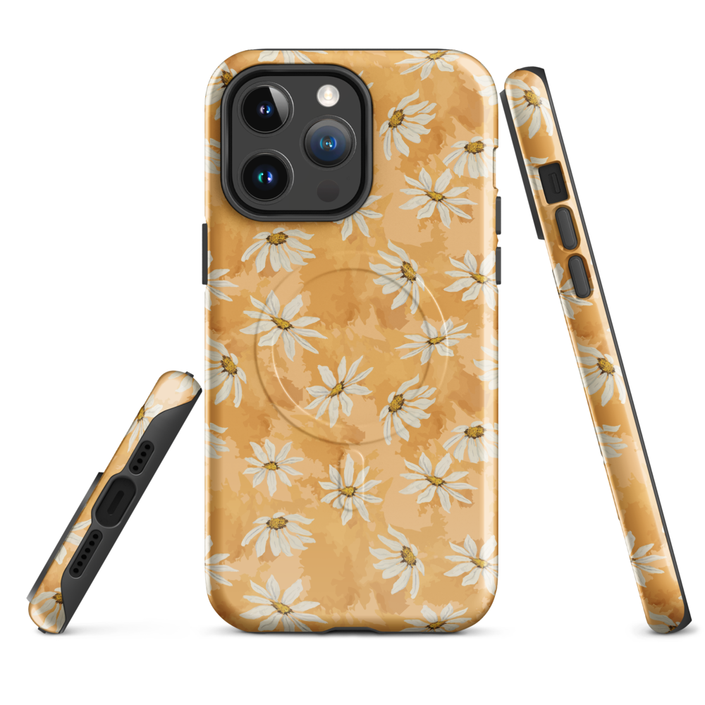 Phone case with white daisy pattern on a warm multi tone peach background