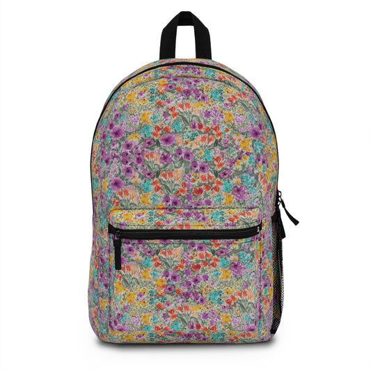 Harmony Blooms in Violets golds oranges and teals-patterned backpack on a white background