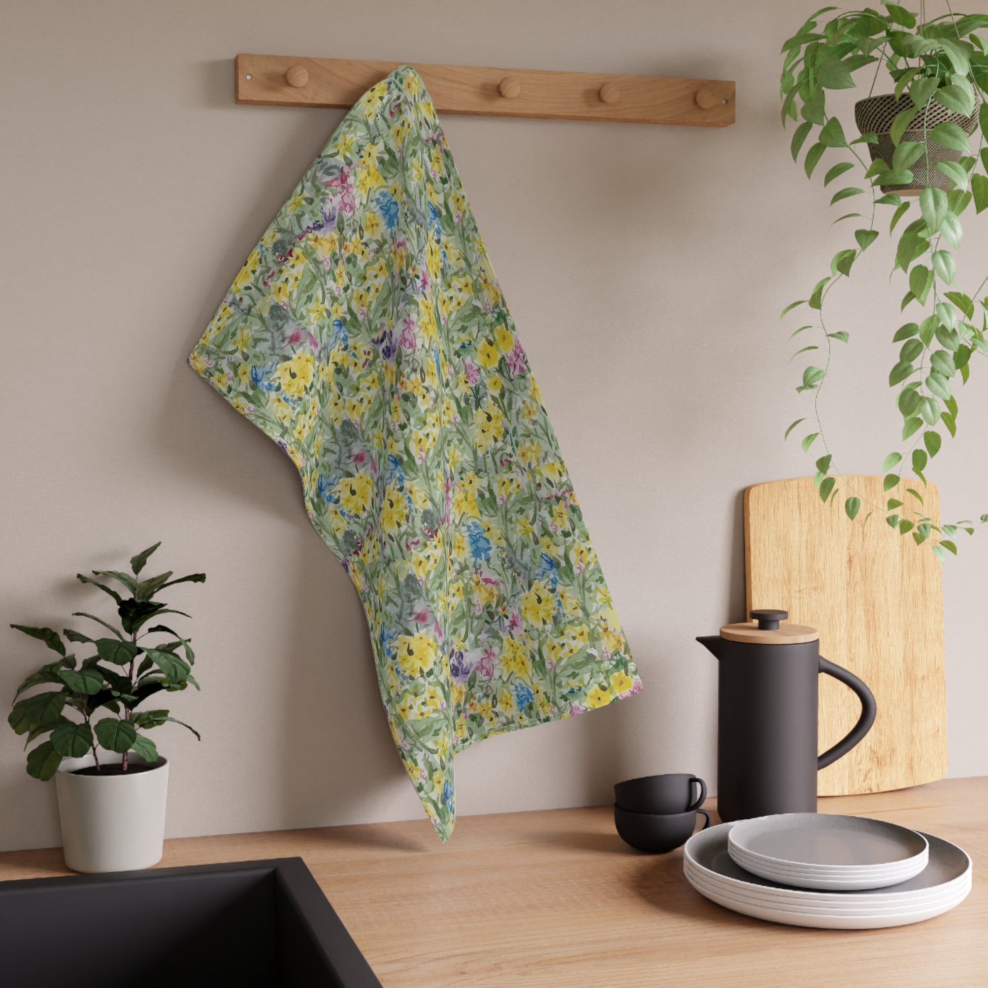 Watercolor wildflower tea towel featuring yellow, blue, and pink floral meadow pattern 