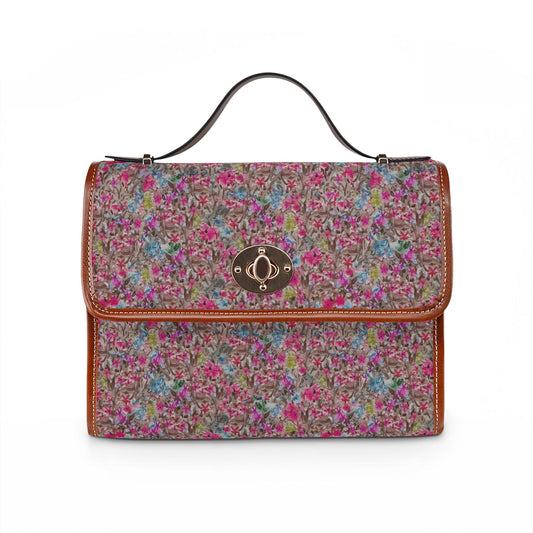 Watercolor floral handbag with wildflower meadow pattern on blush brown background and structured top handle design