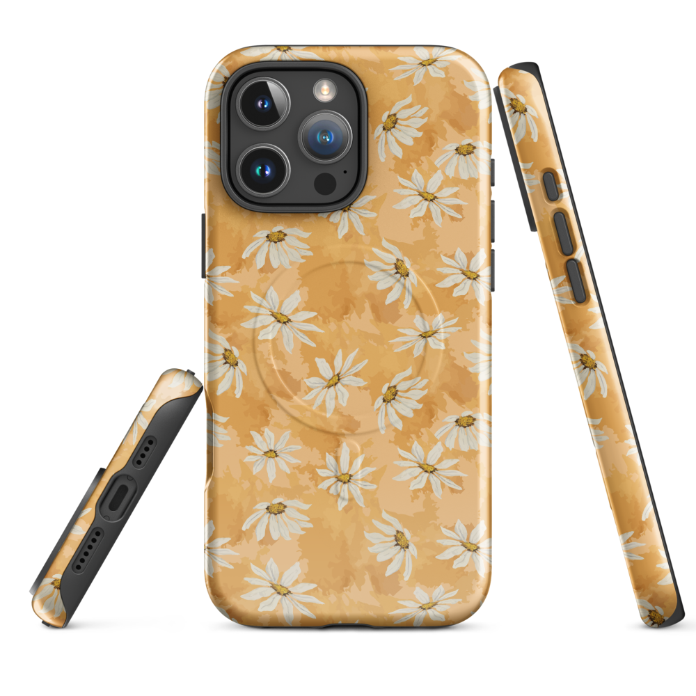 Phone case with white daisy pattern on a warm multi tone peach background