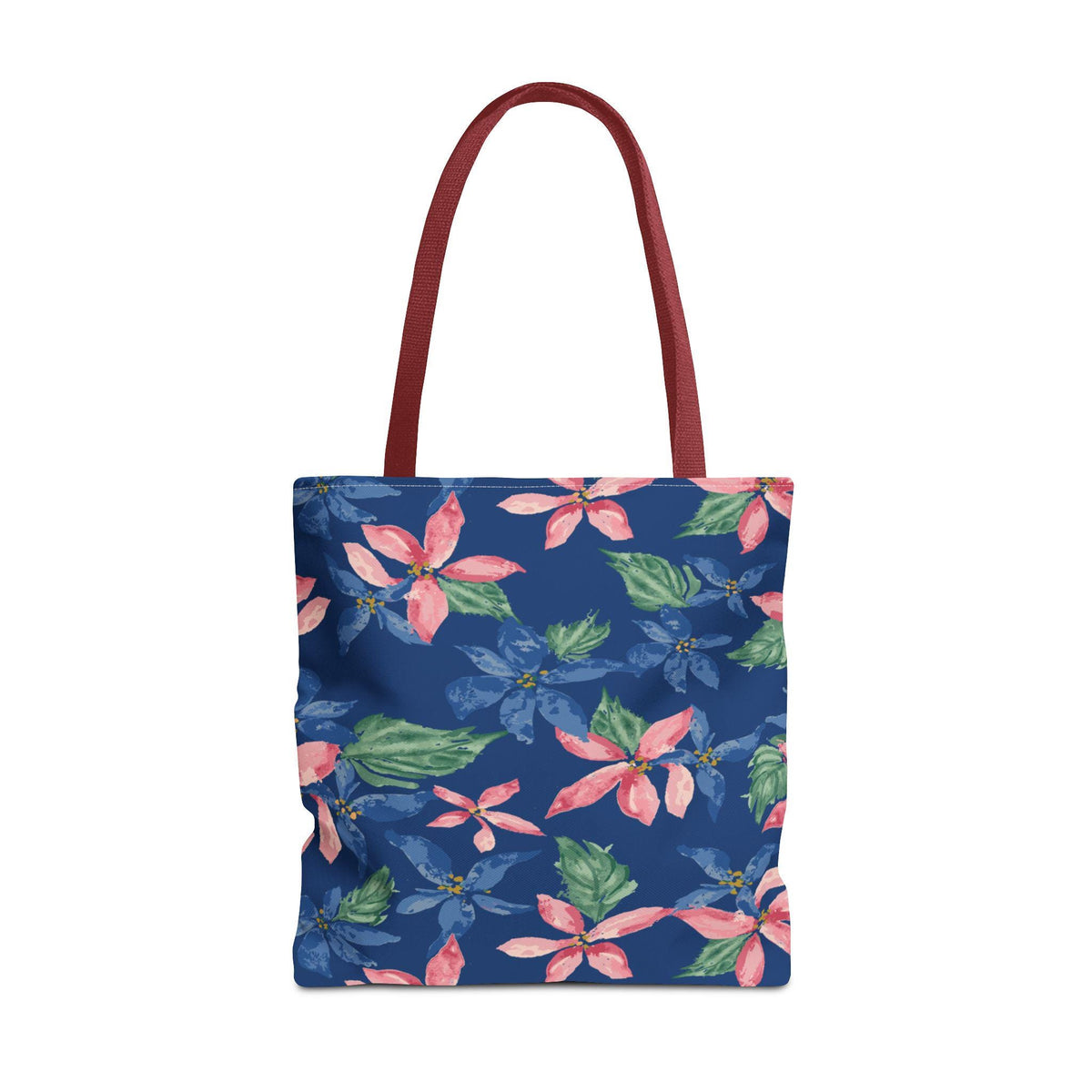 A tote bag with a dark blue background and a floral pattern of pink and blue flowers with green leaves. The bag has a burgundy handle.