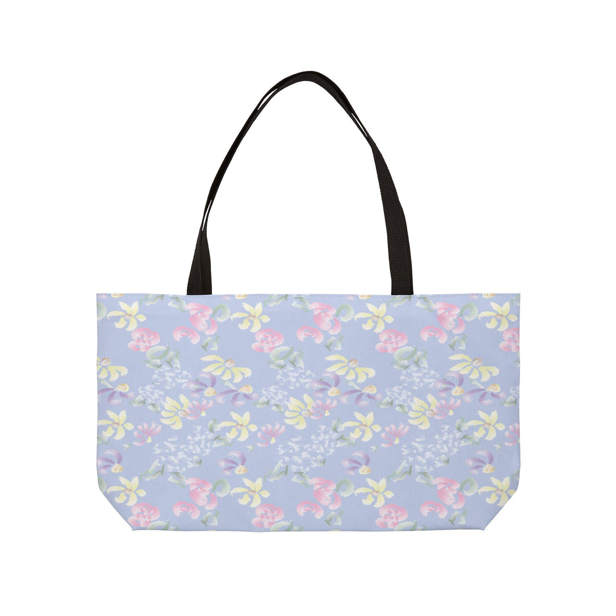 A tote bag with a black handle and a light blue background. The bag is covered in a repeating pattern of pastel-colored flowers in pink, yellow, and purple.