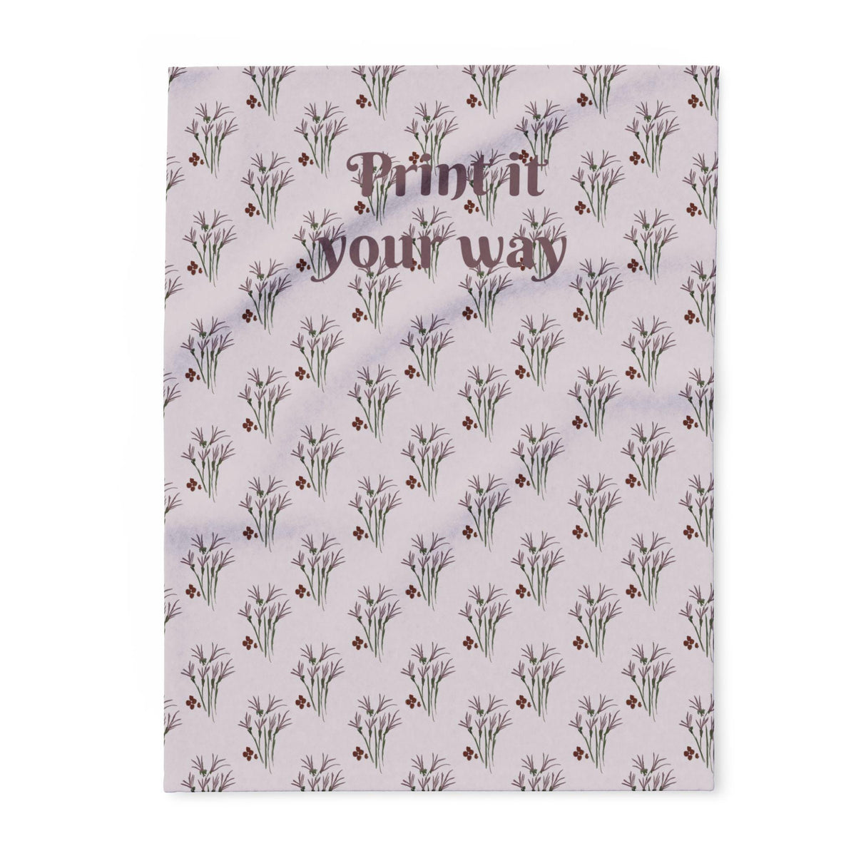 A light purple background with a repeating pattern of stylized floral sprigs in purple and green, with small red accents. The text "Print it your way" is in a darker purple script across the top.