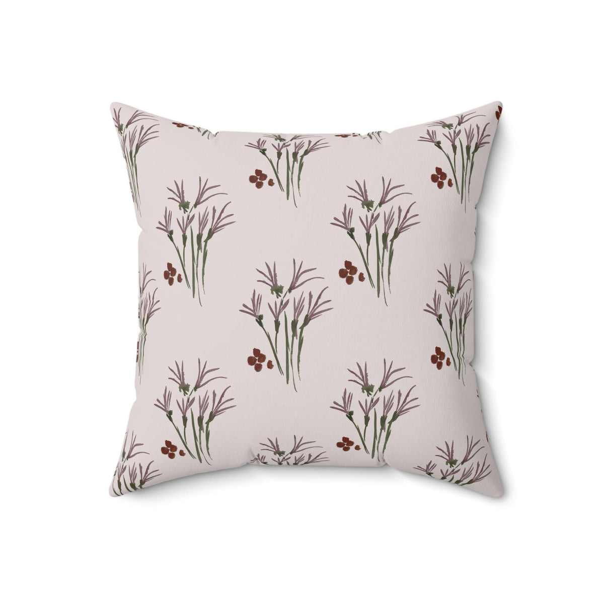 Square throw pillow with a repeating pattern of stylized purple and green floral sprigs and small maroon clusters on a light pink background. The pillow is a soft, decorative accent.