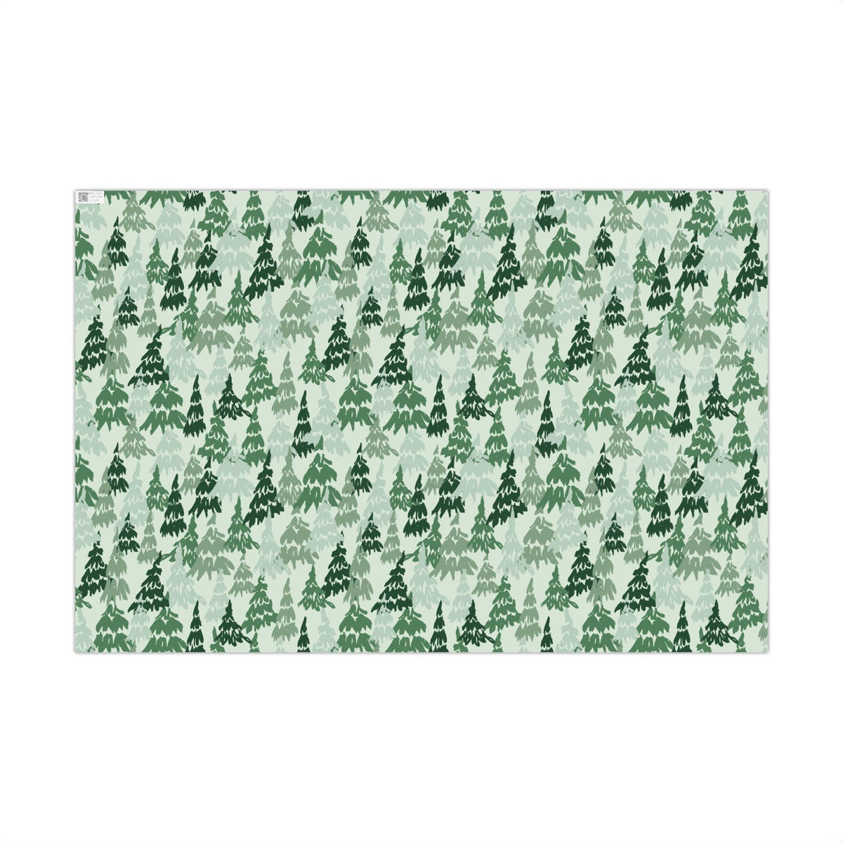Christmas gift wrap paper printed with an evergreen pine watercolor pattern by Kathryn Young