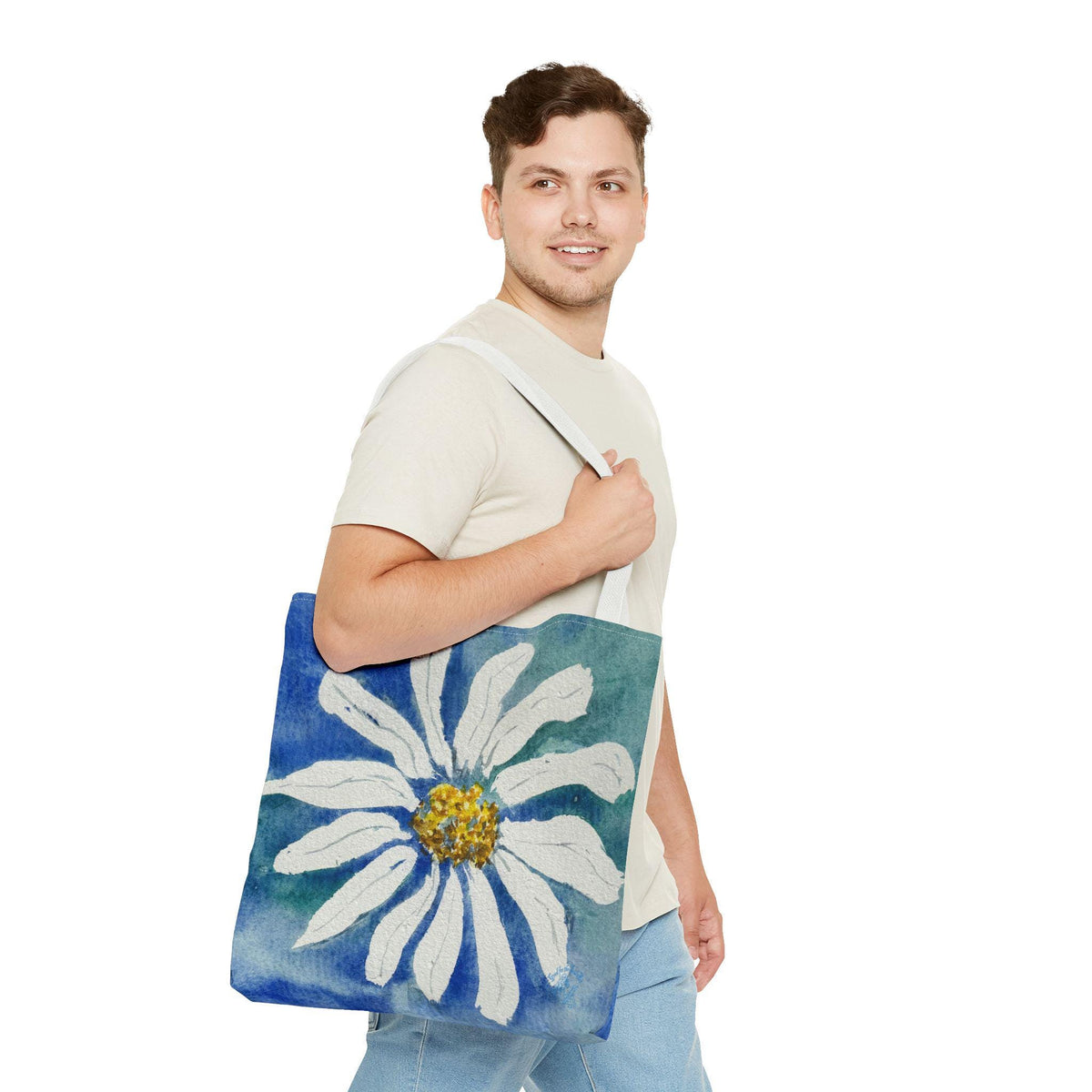 Watercolor daisy tote bag featuring a large hand-painted white daisy with a golden center on a deep blue and teal watercolor background, floral botanical shoulder bag designed from original artwork by Kathryn Young for Good For The Soul Art LLC.